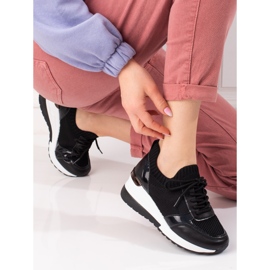 Tênis feminino com parte superior flexível preto 1 Tênis feminino com parte superior flexível preto 1